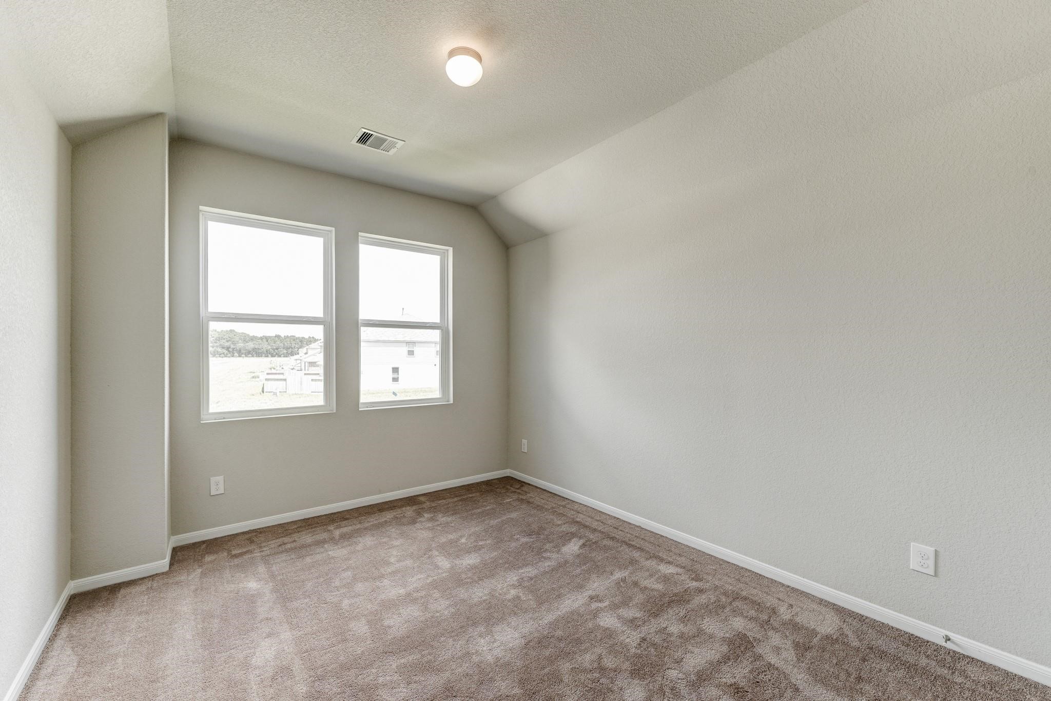 1015 Willowick Road Houston, TX 77090 - Photo 29 of 42 Bedroom #3 offering lots of space for multiple beds or a KING size bed!