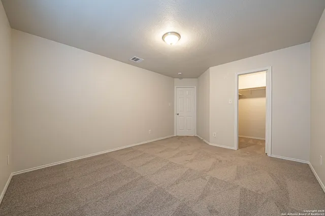 an empty room with an entryway