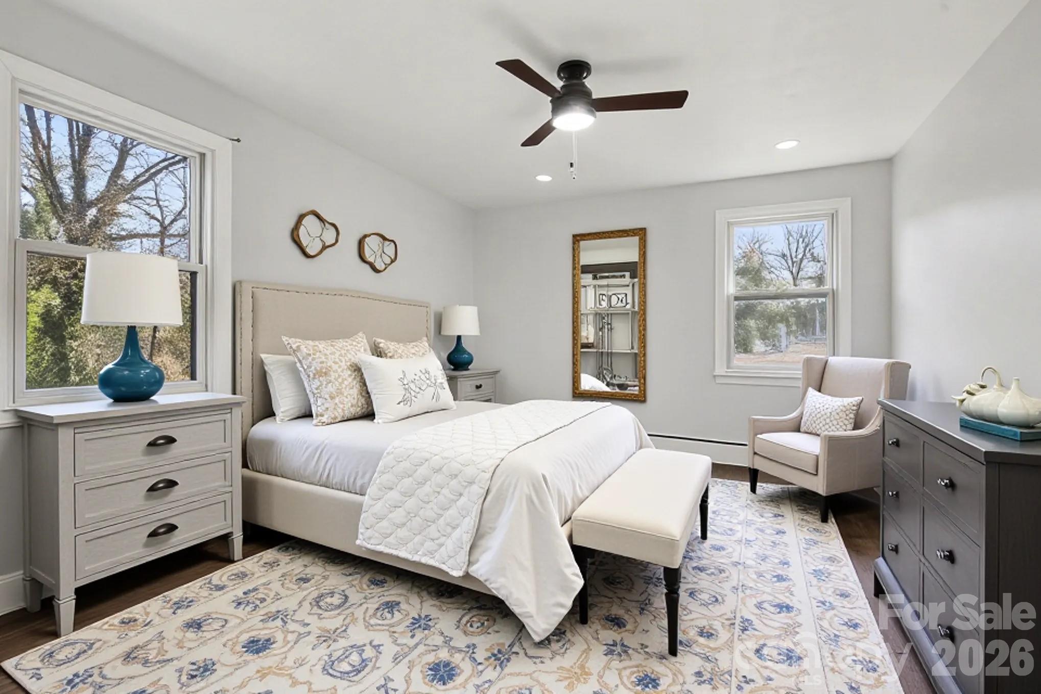 225 Valleyview Place Salisbury, NC 28144 - Photo 14 of 36 a bedroom with a large bed and a window