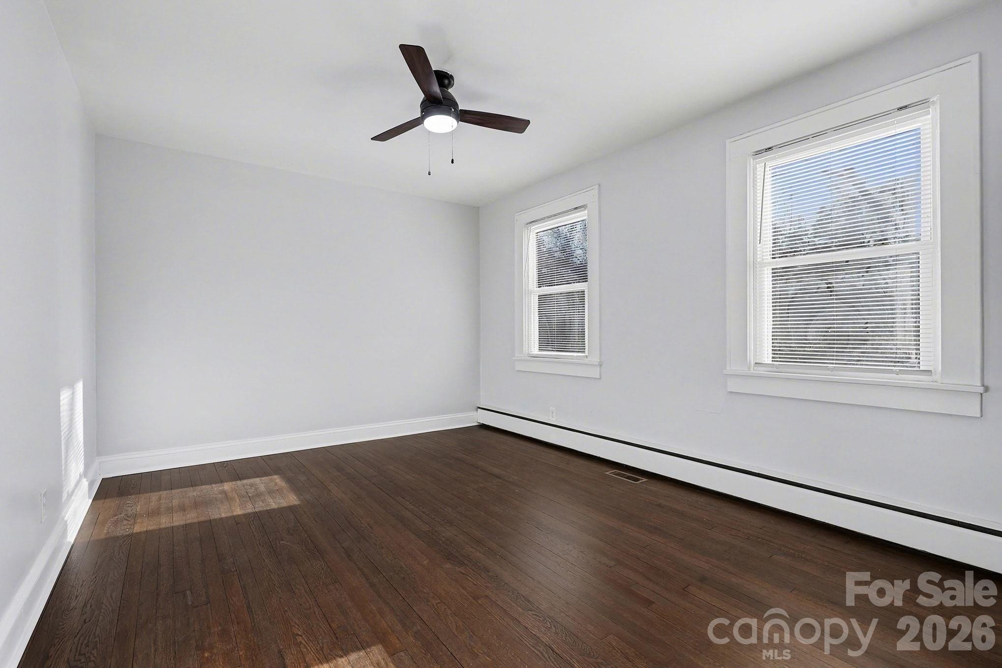 225 Valleyview Place Salisbury, NC 28144 - Photo 19 of 36 wooden floor in an empty room with a window