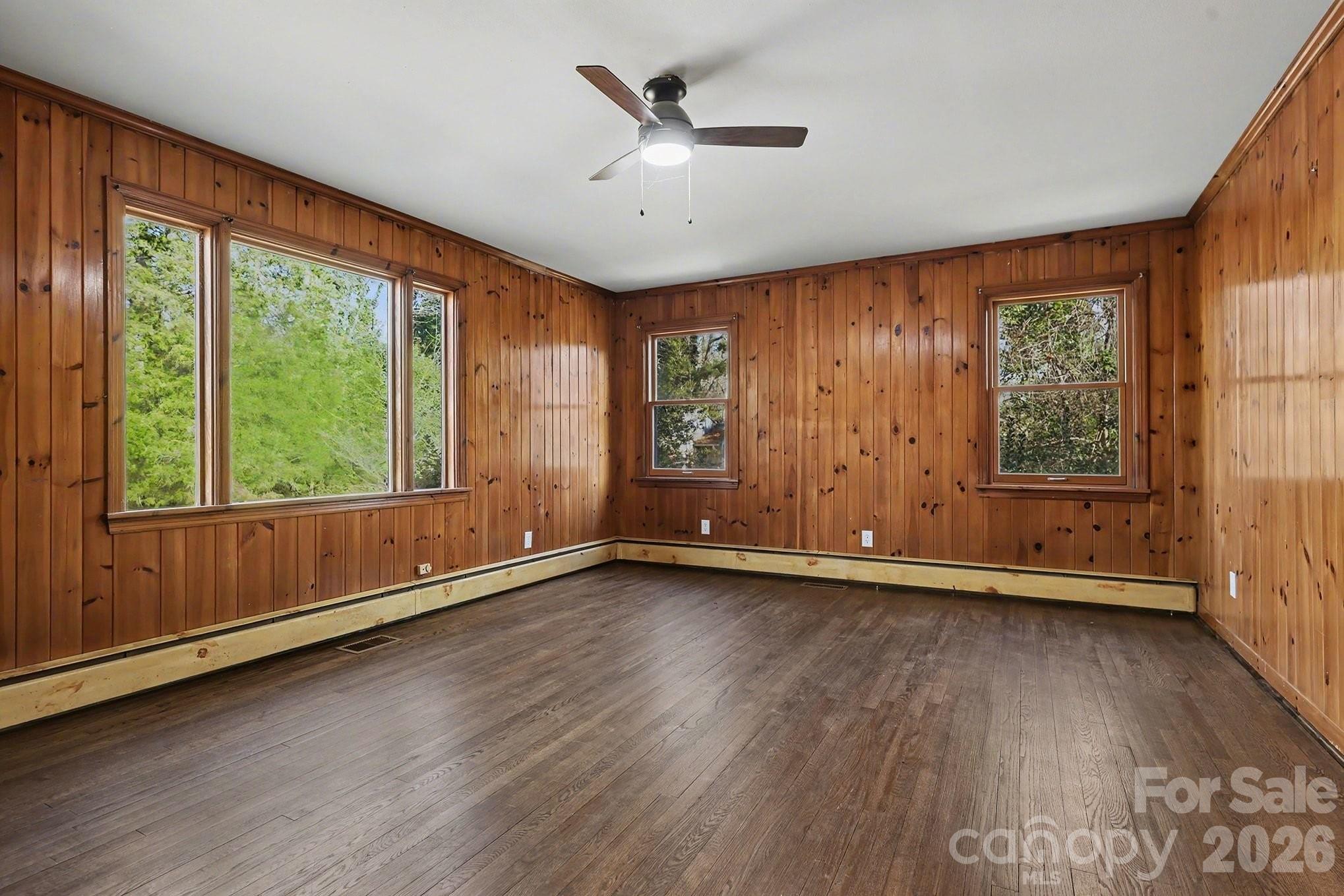 225 Valleyview Place Salisbury, NC 28144 - Photo 25 of 36 an empty room with wooden floor and windows