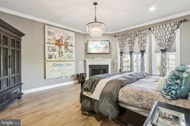 a bedroom with bed and a walk in closet