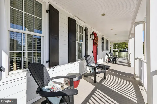 a view of a livingroom with furniture and window