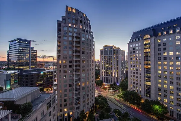a city view with tall buildings