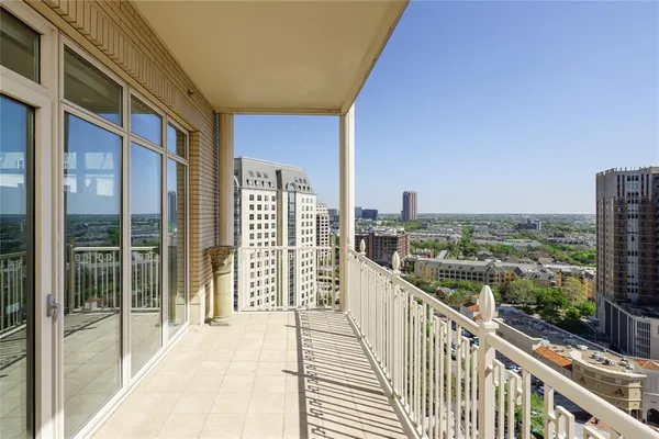 a view of a balcony with city view