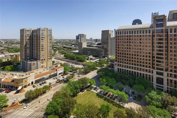 a view of a city with tall buildings
