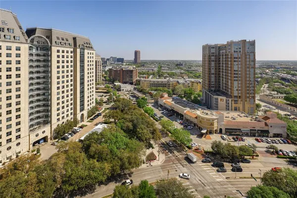a view of a city with tall buildings