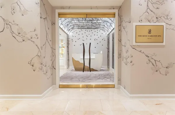 a view of a bathroom with a tub and shower