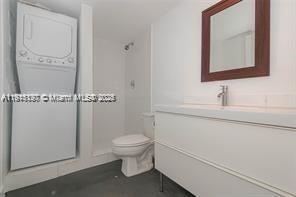 1688 West Avenue, Unit PH07 Miami Beach, FL 33139 - Photo 18 of 26 a bathroom with a toilet sink and mirror