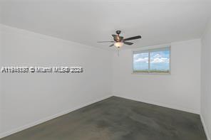1688 West Avenue, Unit PH07 Miami Beach, FL 33139 - Photo 22 of 26 an empty room with windows
