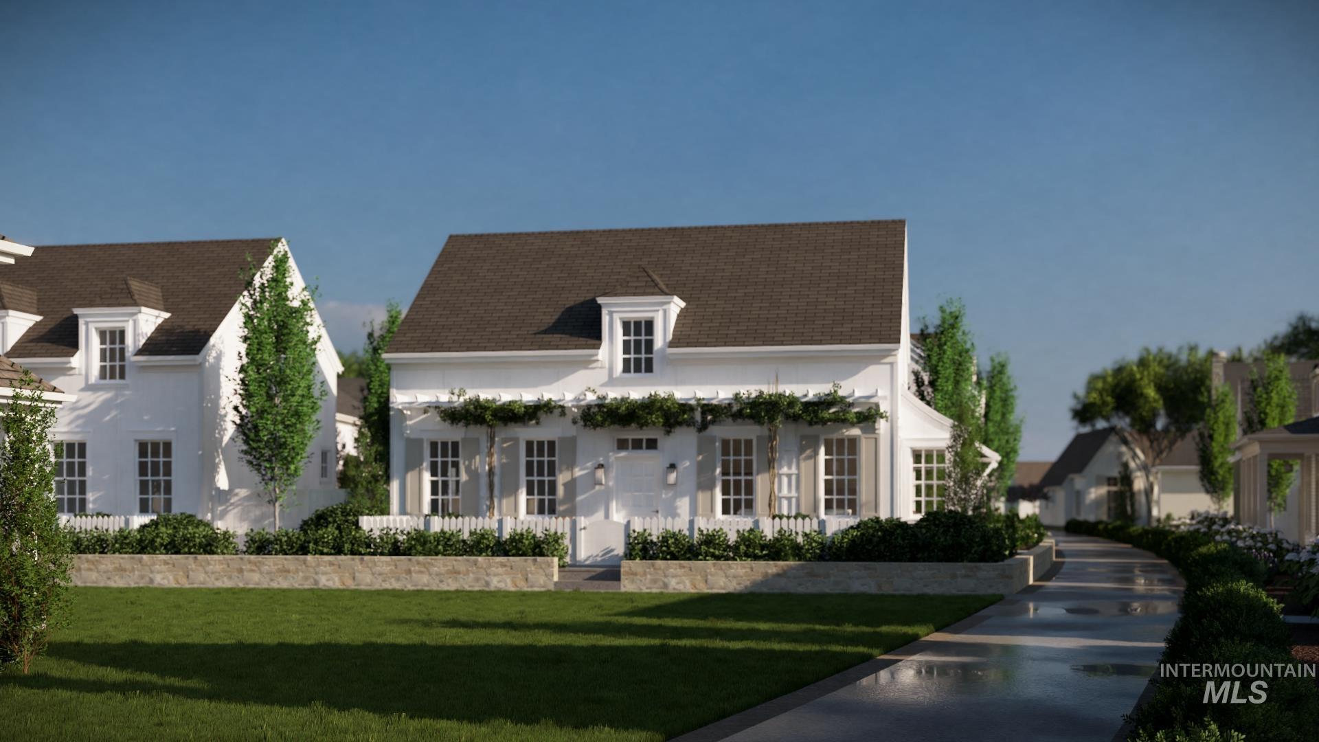 Tbd Tbd Primrose Court, Unit 5 Moscow, ID 83843 - Photo 8 of 20 View of front facade featuring stucco siding, a shingled roof, covered porch, and a front lawn