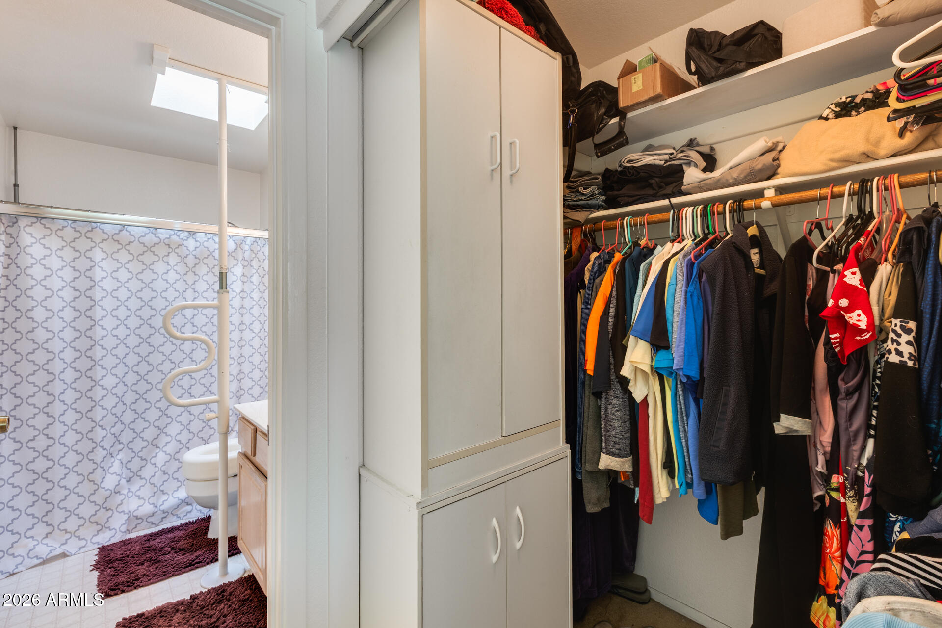 14300 West Bell Road, Unit 482 Surprise, AZ 85374 - Photo 25 of 53 a view of walk in closet with clothes and shoes