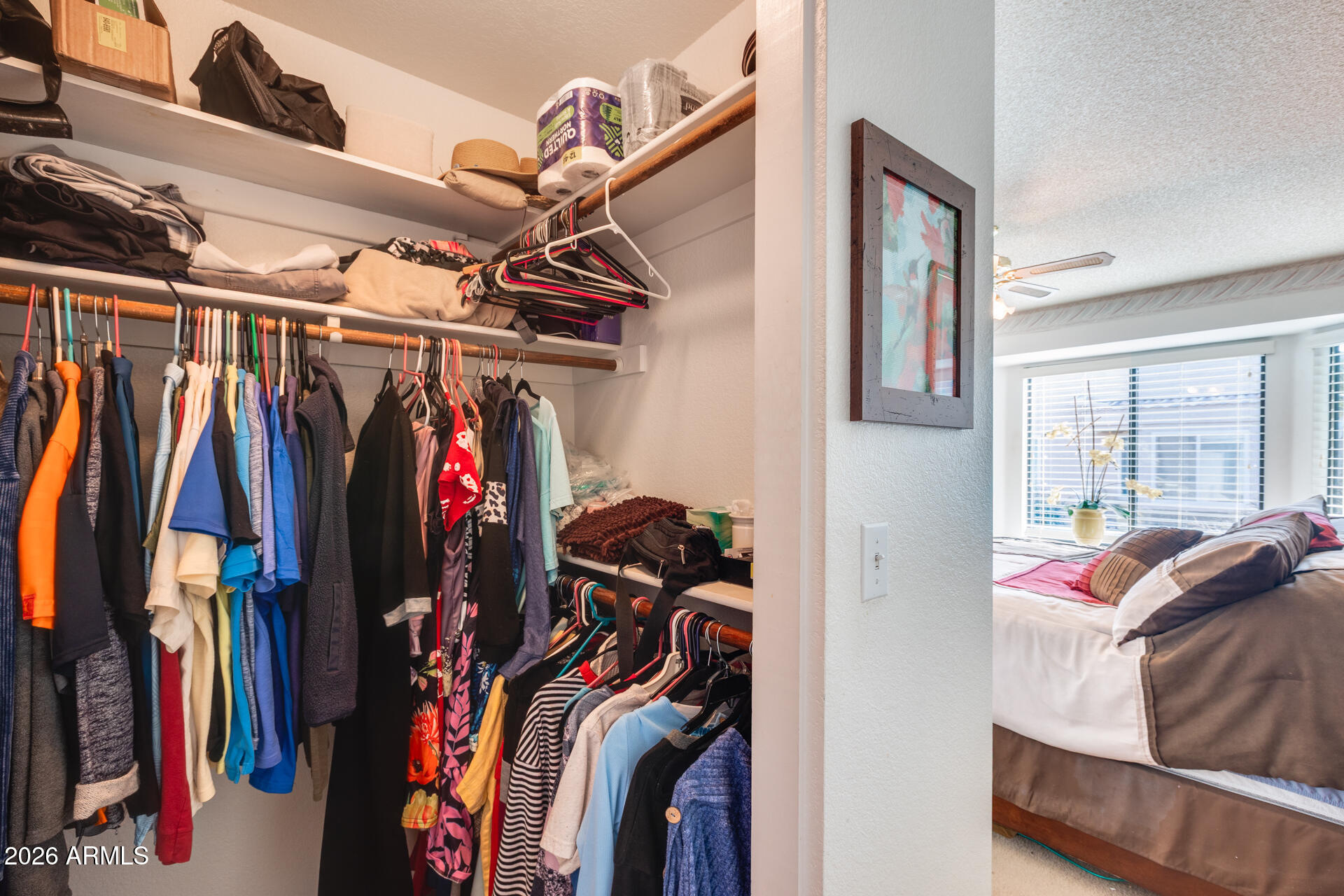 14300 West Bell Road, Unit 482 Surprise, AZ 85374 - Photo 26 of 53 a view of walk in closet with clothes