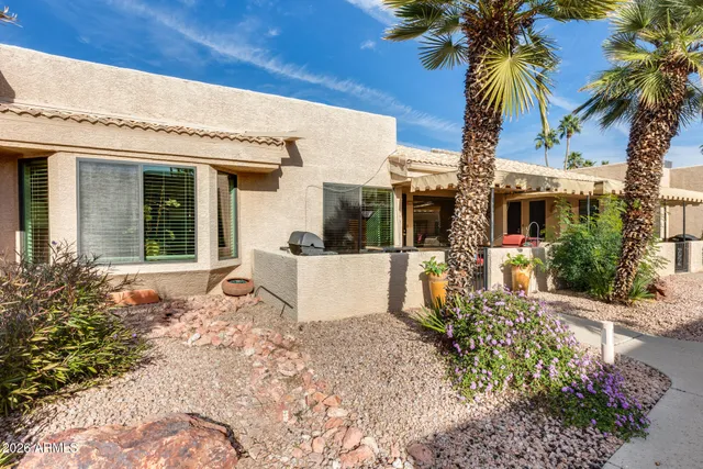a car parked in front of a house