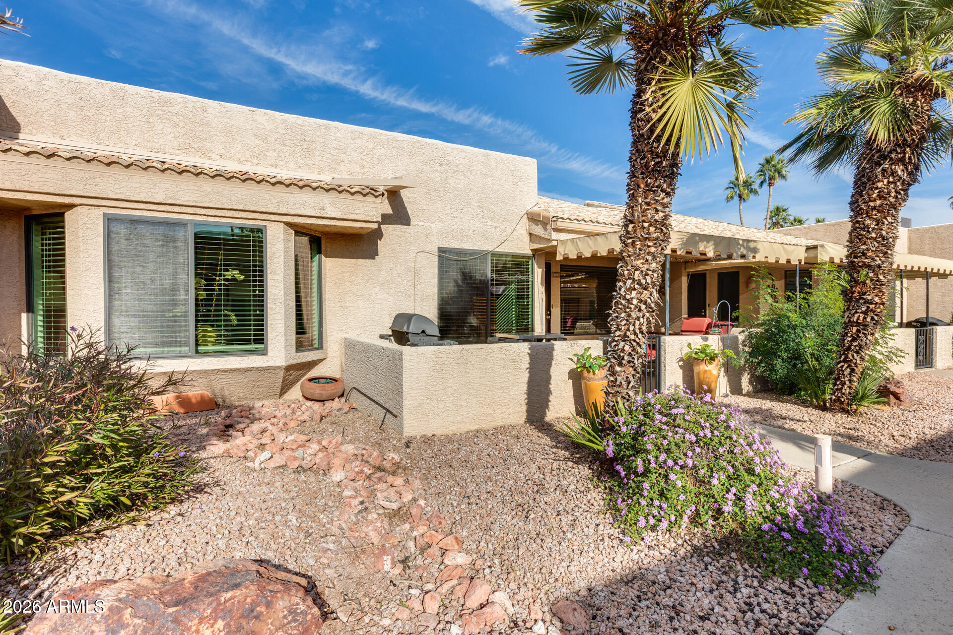 14300 West Bell Road, Unit 482 Surprise, AZ 85374 - Photo 31 of 53 a view of a house with a patio
