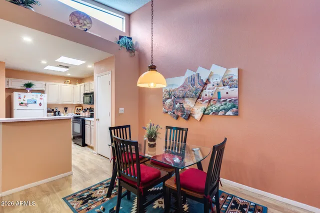 a white refrigerator freezer sitting in a kitchen