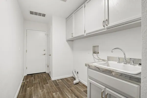 a bathroom with a shower and a bath tub