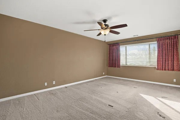 a view of an empty walk in closet