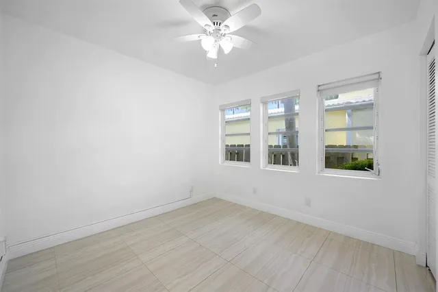 a view of a park with a tree