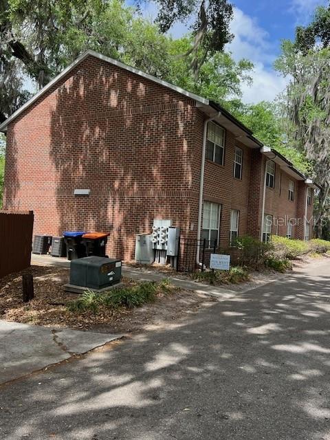 120 Northwest 9th Street Gainesville, FL 32601 - Photo 5 of 10 a backyard of a house with yard fire pit and outdoor seating