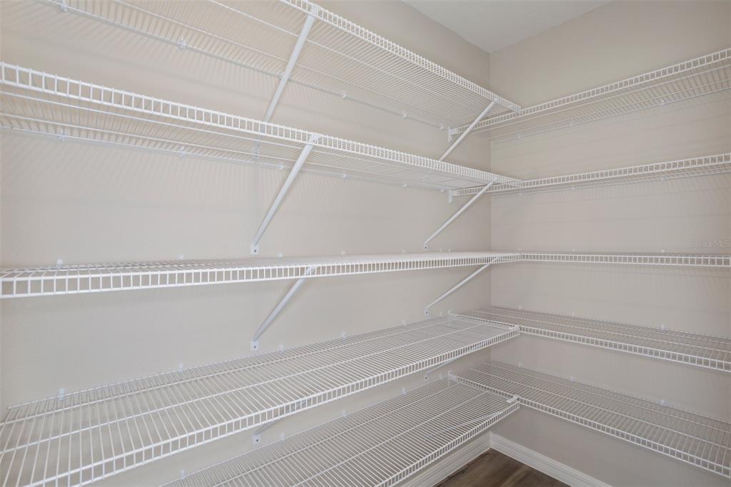 5848 Heaven Road Haines City, FL 33844 - Photo 13 of 35 a view of a room with empty racks