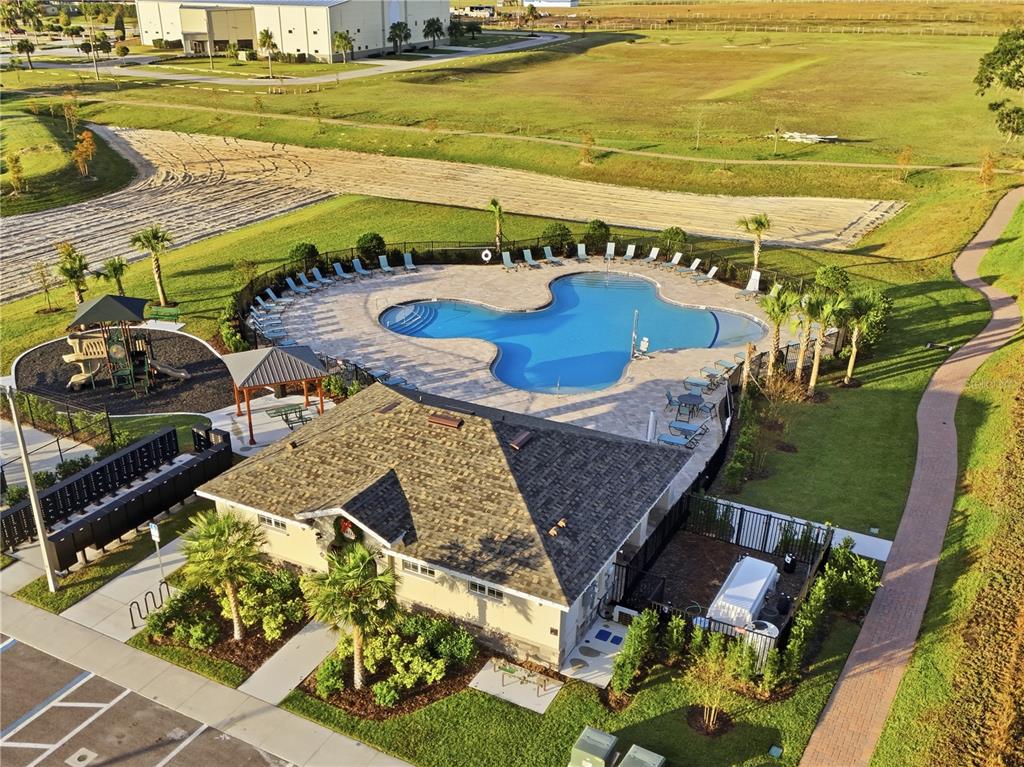 5848 Heaven Road Haines City, FL 33844 - Photo 33 of 35 a view of a swimming pool with an ocean view