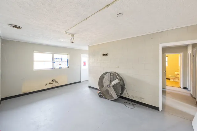 an empty room with windows