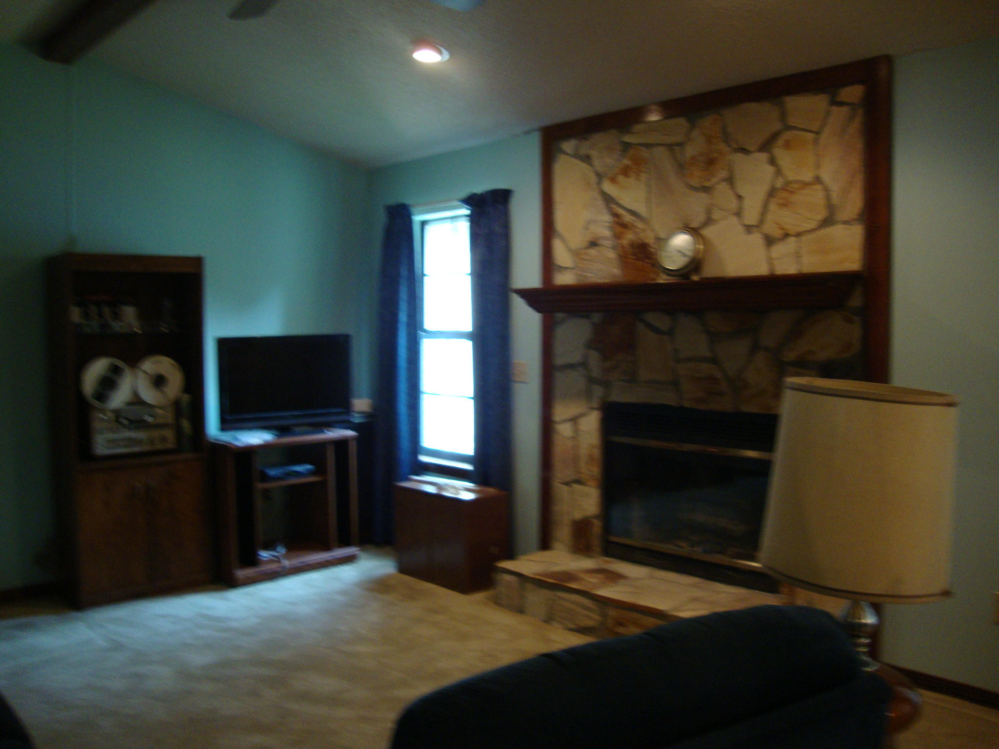 312 Riley Road Niceville, FL 32578 - Photo 15 of 21 a bedroom with a bed and a television
