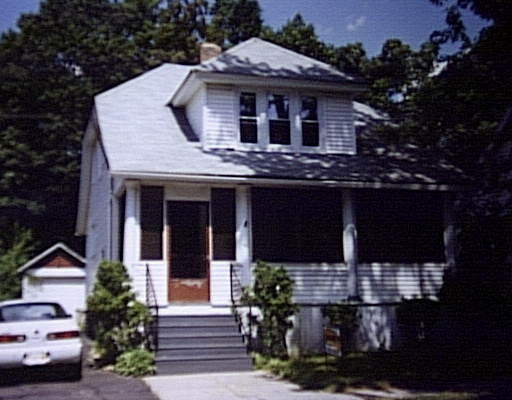 141 Daviston Street Springfield, MA 01108 - Photo 1 of 1 a front view of a house with yard