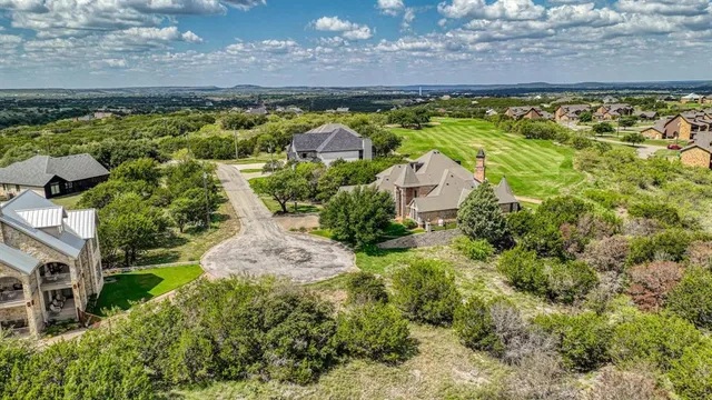 a view of swimming pool with a yard