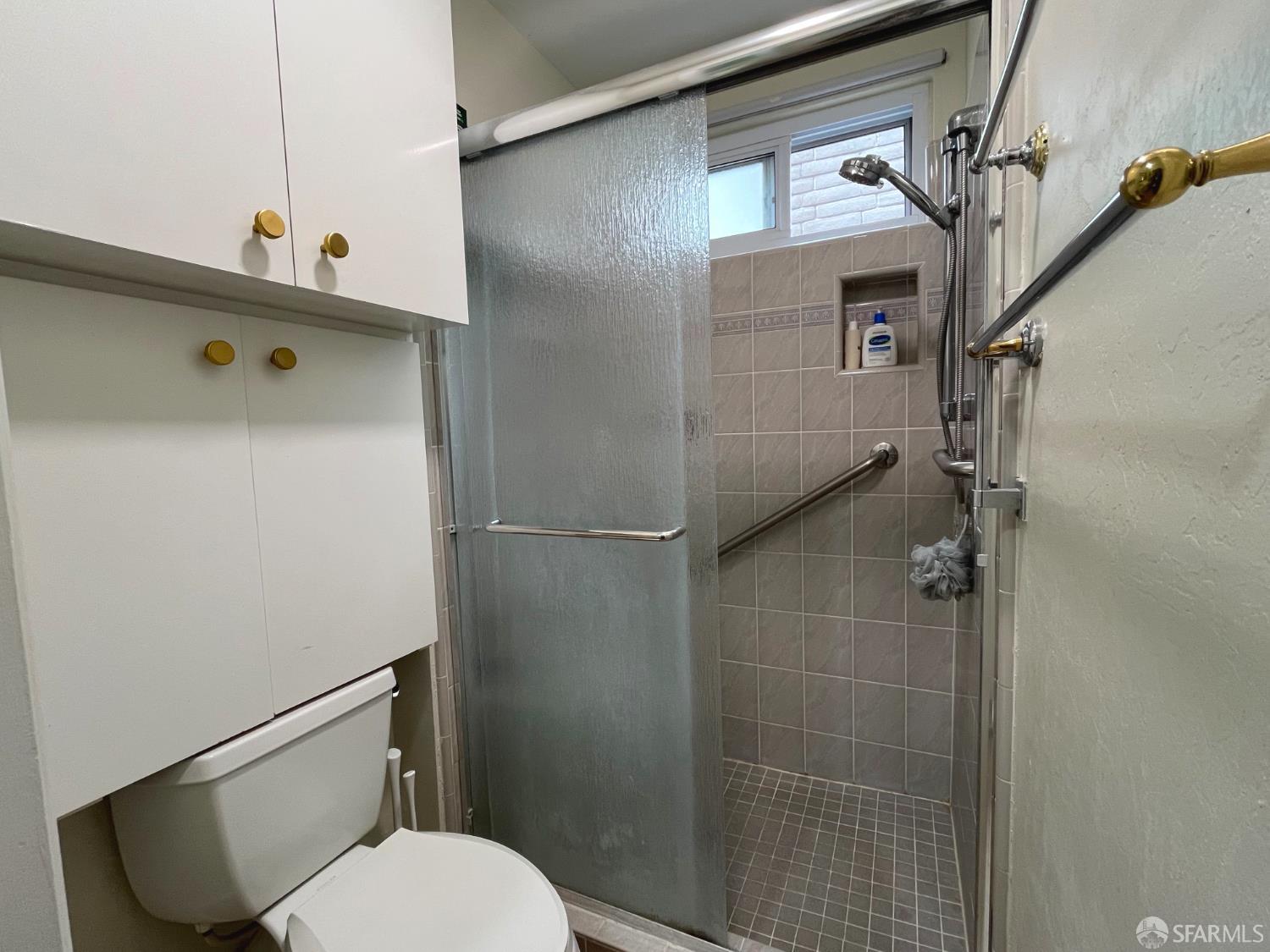 1032 Everglades Drive Pacifica, CA 94044 - Photo 20 of 37 a bathroom with a toilet and a shower