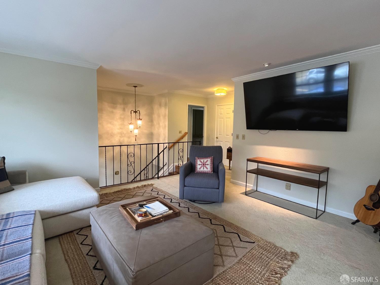1032 Everglades Drive Pacifica, CA 94044 - Photo 5 of 37 a living room with furniture and a flat screen tv