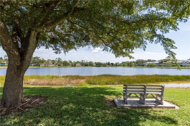 a view of a lake with a garden