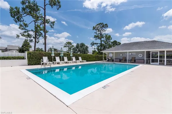 a view of outdoor space and swimming pool