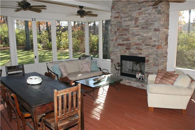 4328 Estes Road Nashville, TN 37215 - Photo 17 of 20 A whole other room...screened deck with stone fireplace opens from the family room & overlooks the private back.