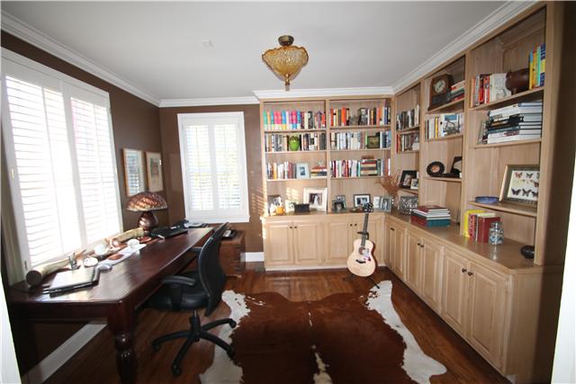 4328 Estes Road Nashville, TN 37215 - Photo 4 of 20 Library/office features hardwood floor, original built-in cabinets & shelves, plantation shutters & original double doors.