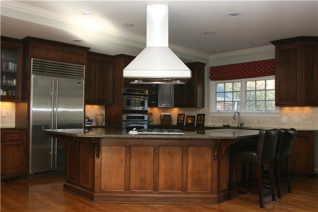 4328 Estes Road Nashville, TN 37215 - Photo 6 of 20 What a kitchen! Custom cabinets w/granite counter tops & tumbled stone back splash. SubZero, Bosch dw, GE Profile oven, GE Advantium & warming drawer. Huge island w/Wolf gas cooktop & stainless Vent-a-Hood & eating bar!