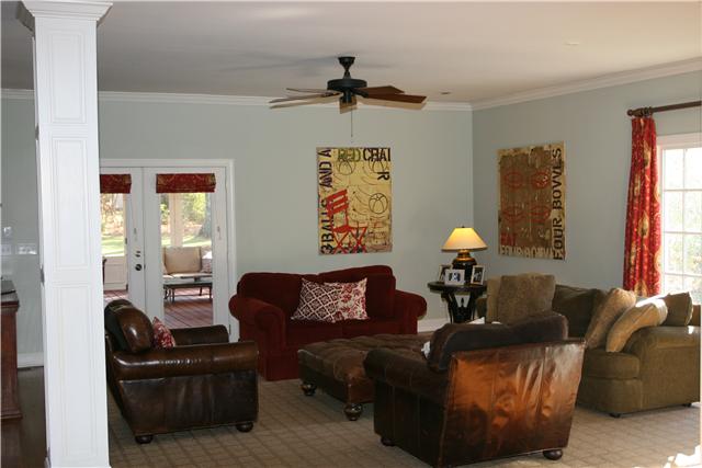 4328 Estes Road Nashville, TN 37215 - Photo 8 of 20 Family room features hardwood floor, custom drapes & large window overlooking side garden area.