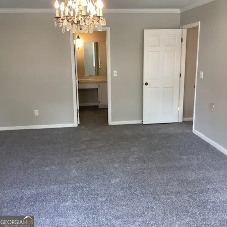a view of a livingroom with a chandelier