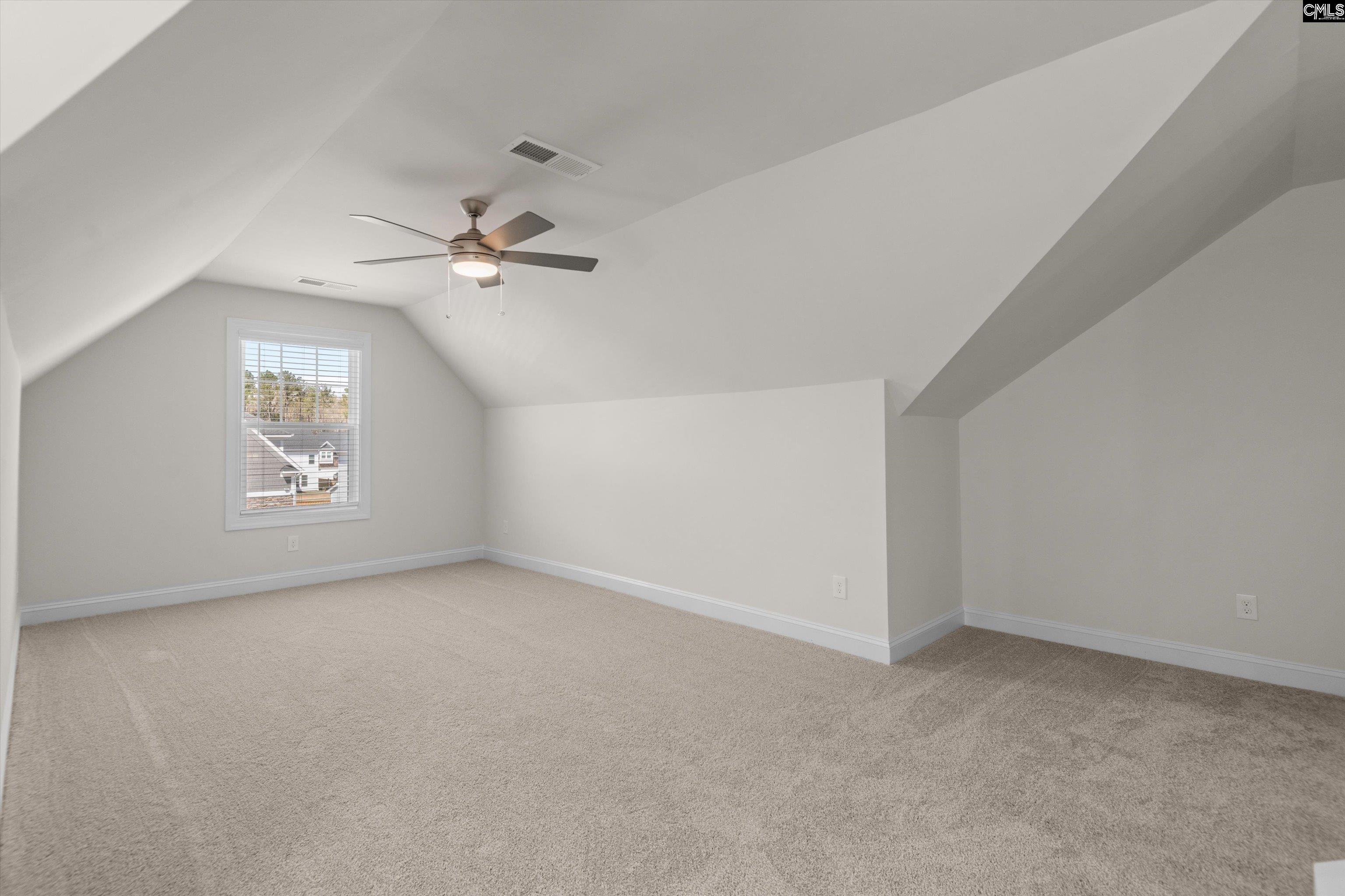 558 Wild Ginger Loop Irmo, SC 29063 - Photo 38 of 42 an empty room with fan and windows
