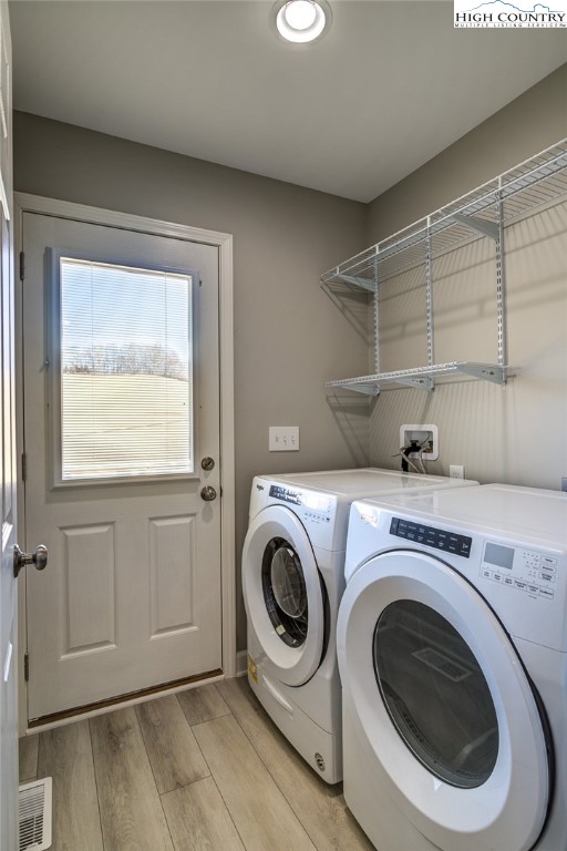 142 Casey Overlook Lane, Unit 82 Boone, NC 28607 - Photo 30 of 43 a utility room with dryer and washer