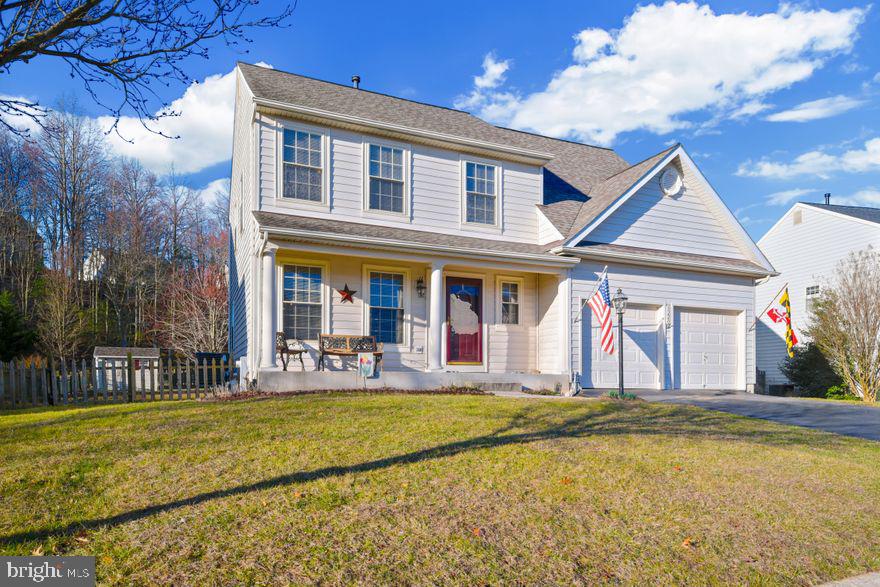 Inviting, full front porch for sitting out.