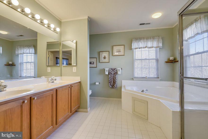 8220 Selwin Court Rosedale, MD 21237 - Photo 22 of 36 Large master bath with shower and tub