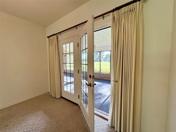 a view of a large room with a large window