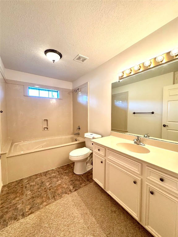 20 Shallow Springs Trinity, TX 75862 - Photo 36 of 48 a bathroom with a double vanity sink a toilet and a tub