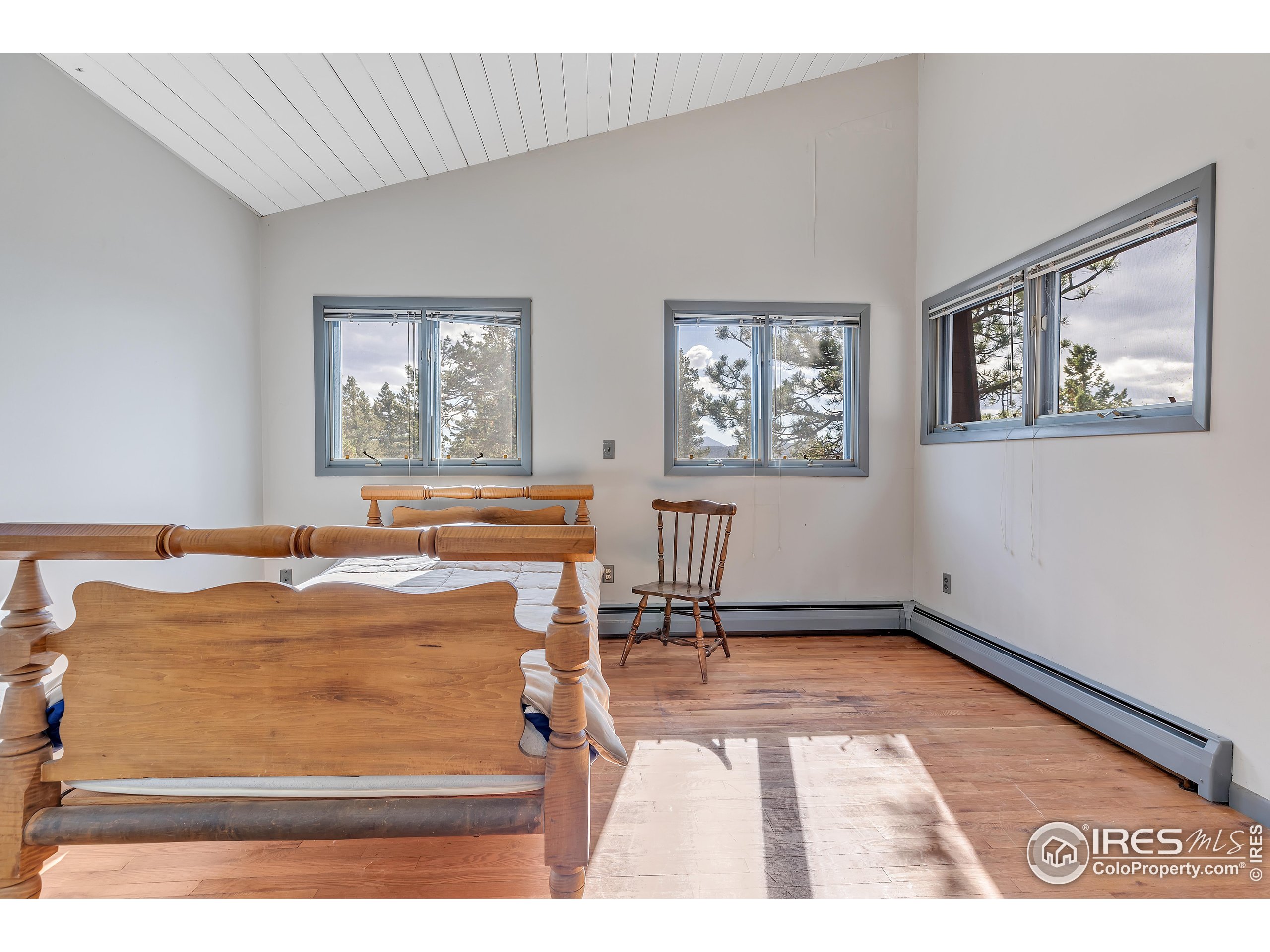 5566 Sugarloaf Road Boulder, CO 80302 - Photo 16 of 35 a view of a room with furniture and a window