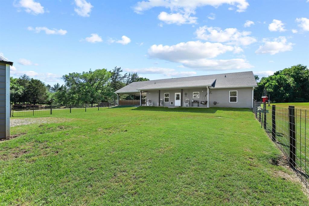 2658 Oak Ridge Road Denison, TX 75021 - Photo 32 of 37 a view of house with a big yard