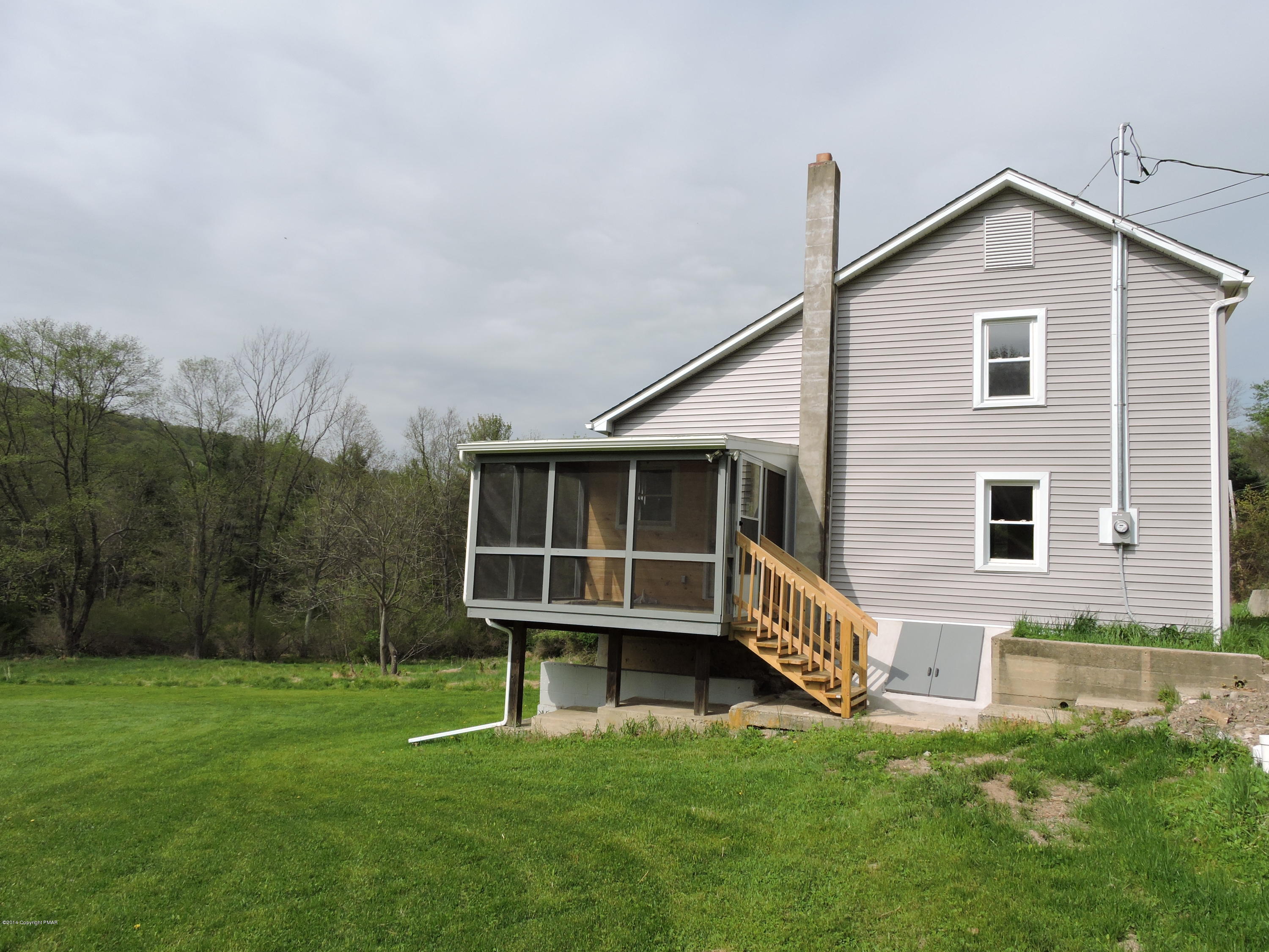 1 Lower Cherry Valley Road Stroudsburg, PA 18360 - Photo 27 of 33 Side View w Screened Porch