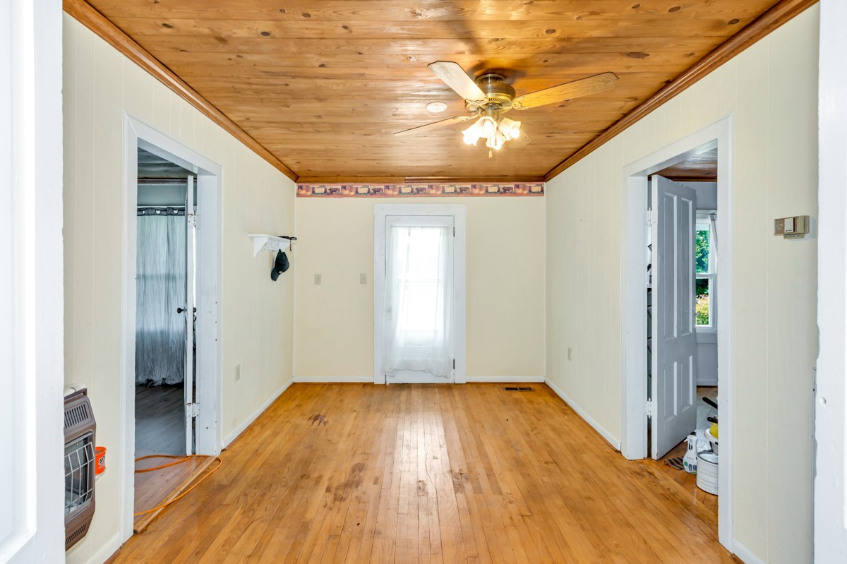 33448 Ardmore Ridge Road Ardmore, TN 38449 - Photo 9 of 19 a view of empty room with wooden floor and fan