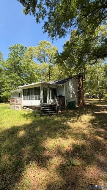 2597 Varney Road Henrico, VA 23231 - Photo 18 of 24 Screened porch with steps to outdoor decking and a
